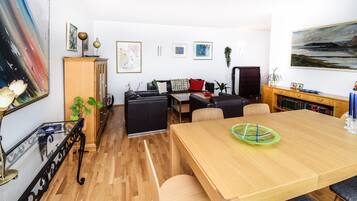 City Apartment, 1 Bedroom | Living area | TV