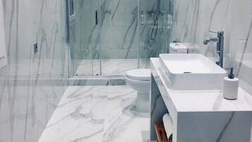 Shower, hair dryer, towels, soap