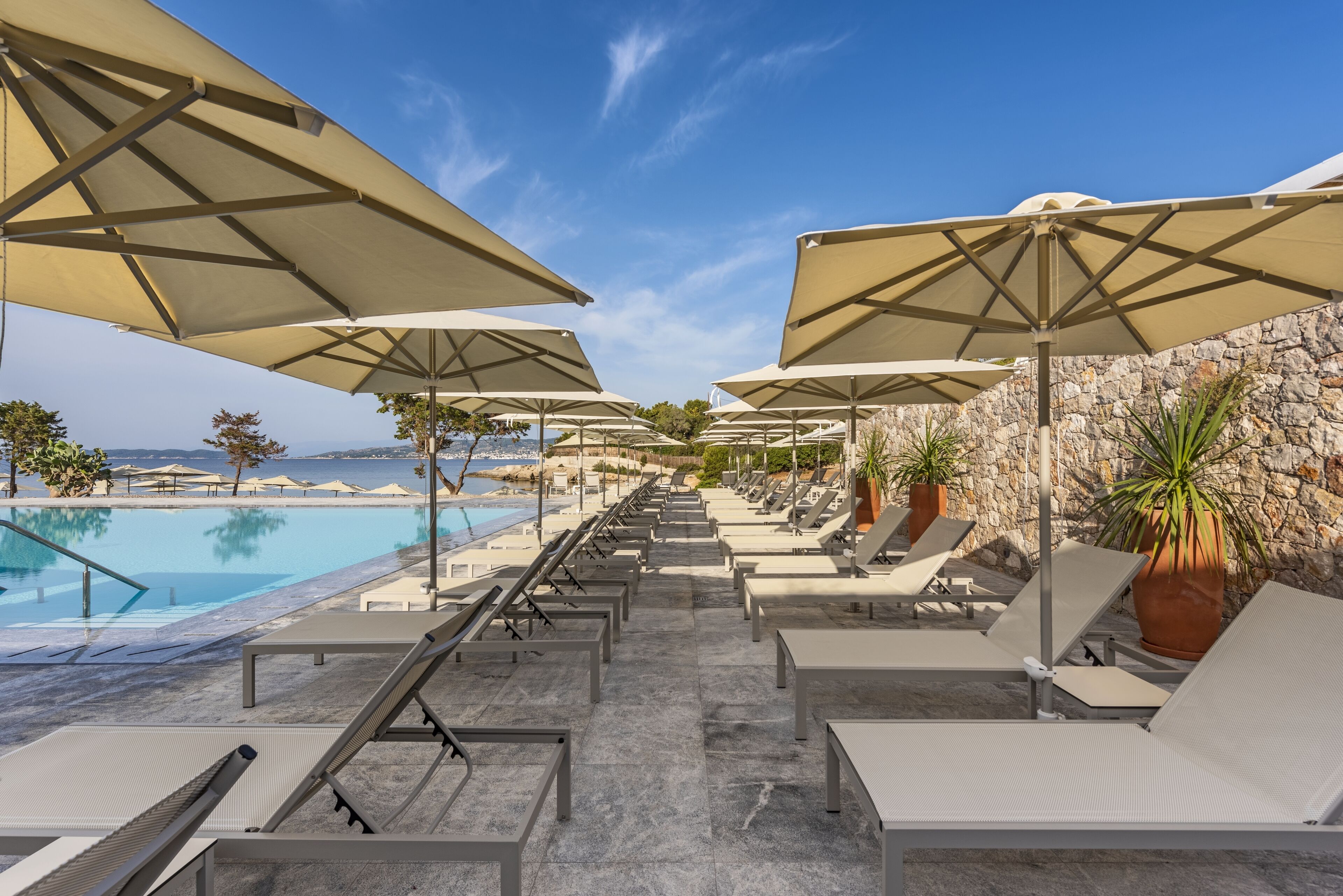 Outdoor pool, pool umbrellas, pool loungers