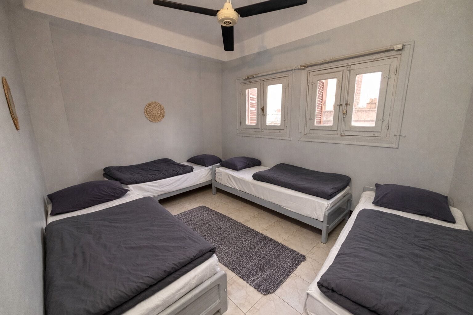 Quadruple Room, Shared Bathroom | Blackout drapes, free WiFi, bed sheets