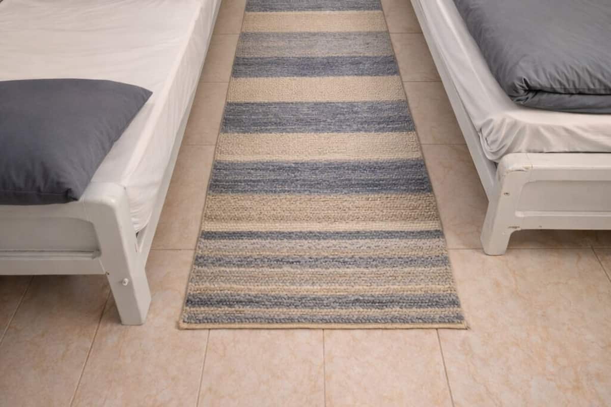 Triple Room, Shared Bathroom | Blackout drapes, free WiFi, bed sheets