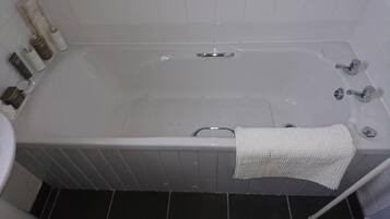 Hair dryer, slippers, towels, soap