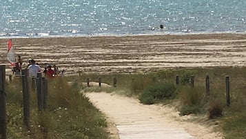 On the beach, sun loungers