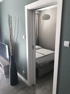 Blackout curtains, iron/ironing board, bed sheets