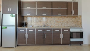 Deluxe Apartment | Living area | Flat-screen TV - Koloseo Rezidence (Sarandë)