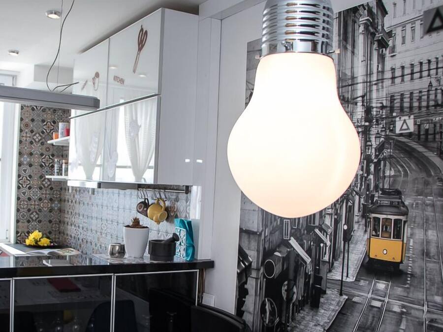 Deluxe appartement, uitzicht op de stad | Privékeuken | Een koelkast met diepvriezer, een microgolfoven, een oven, een kookplaat