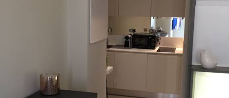 Microwave, oven, coffee/tea maker, cookware/dishes/utensils