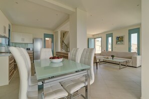 Villa 3 Bedrooms with Private pool, Accessible | Dining room - Ouzo Panoramic Houses 2, with private pool (Lesvos)