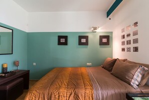 Apartamento, 1 habitación, vistas al jardín, planta baja | 1 dormitorio y ropa de cama de alta calidad