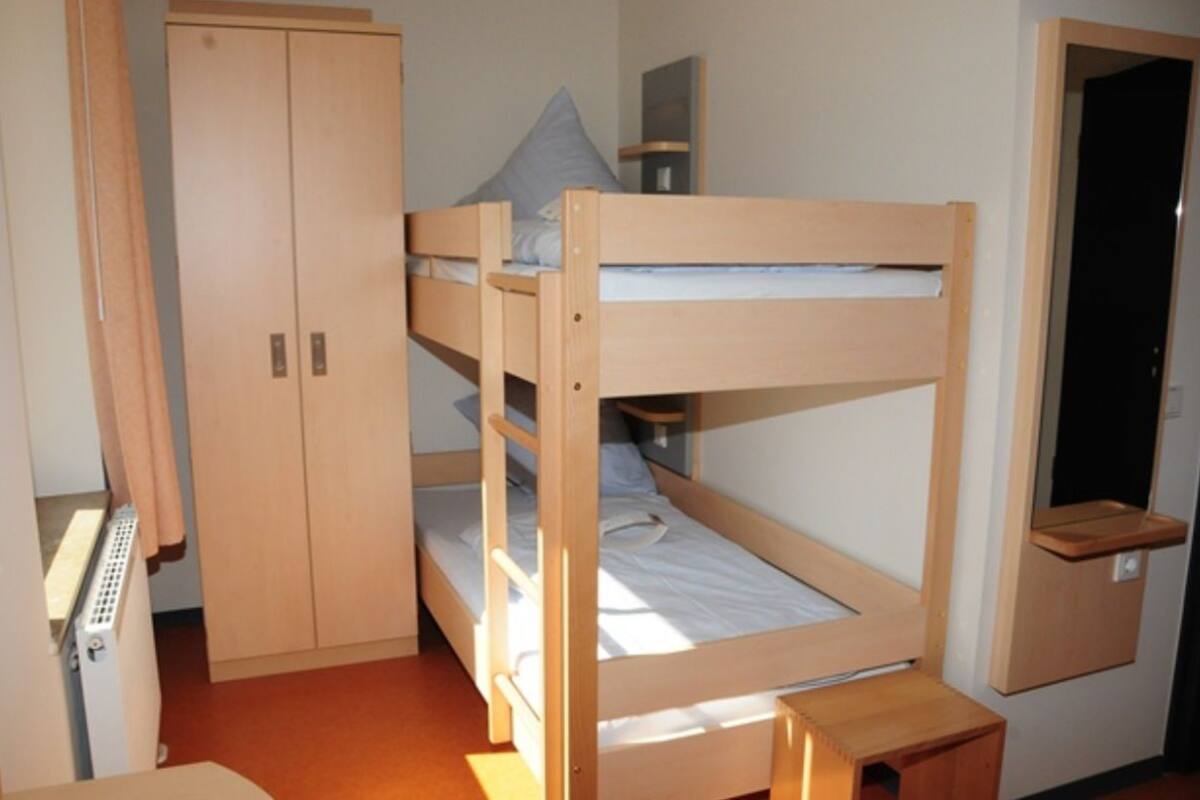 Desk, iron/ironing board, free cribs/infant beds, free rollaway beds