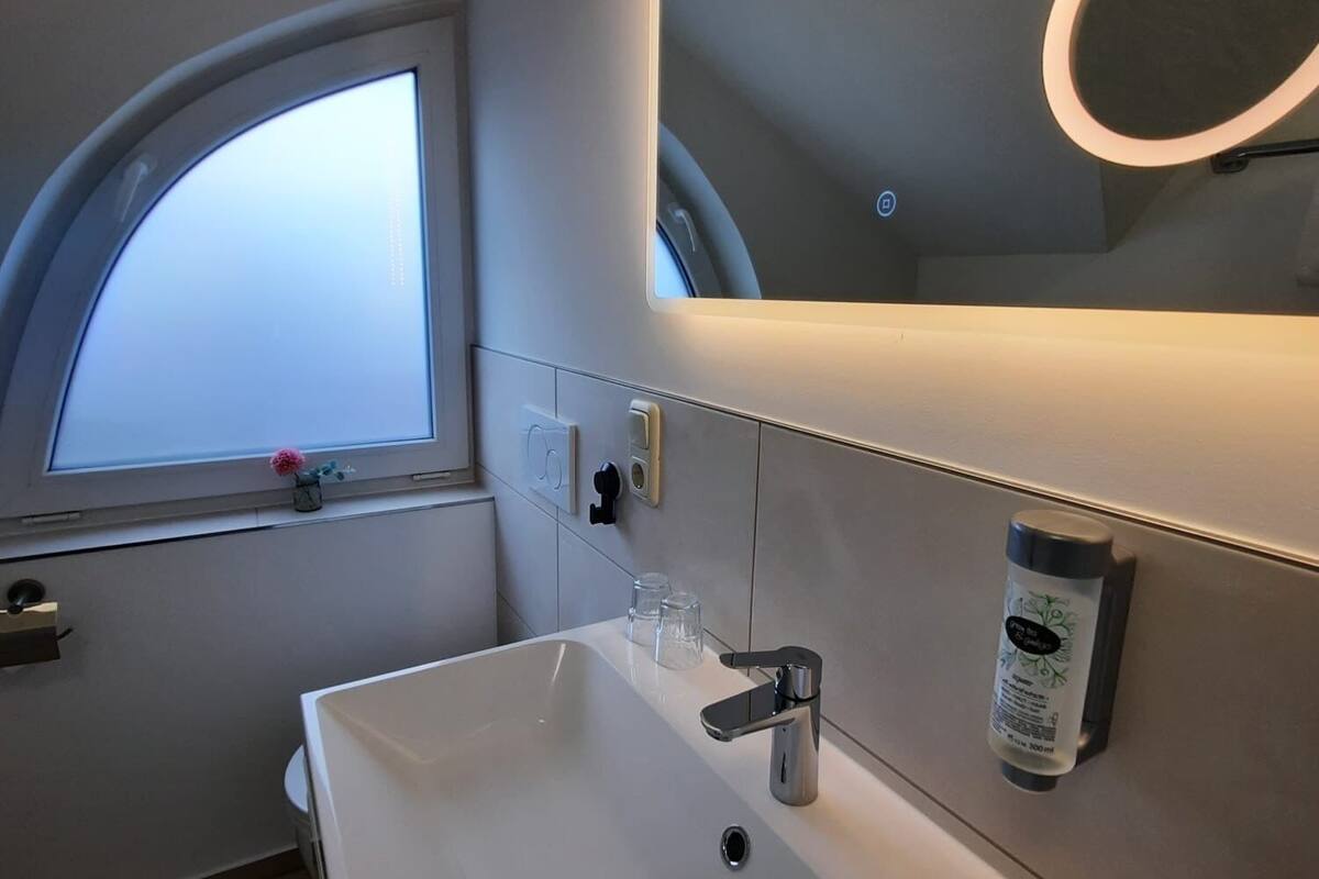 standard double room | bathroom | eco-friendly toiletries, hair dryer, towels