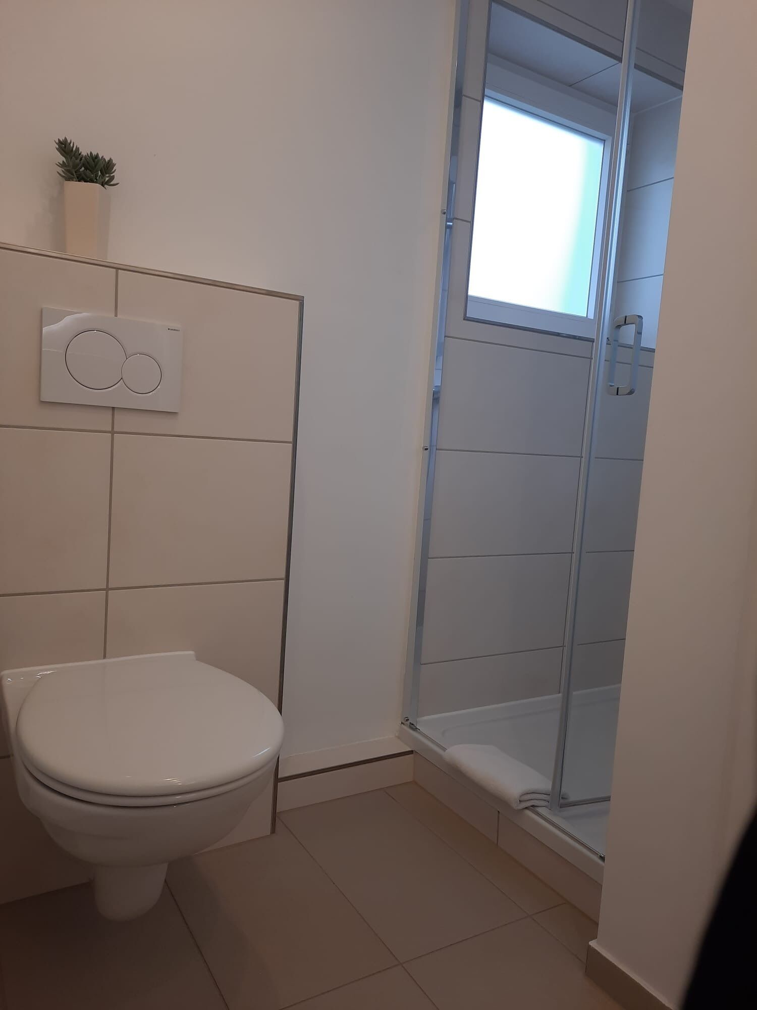 economy single room | bathroom | eco-friendly toiletries, hair dryer, towels