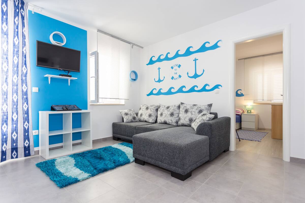 Apartment, 1 Bedroom (Sea) | Living area | LED TV