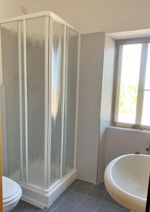 Shower, free toiletries, hair dryer, bathrobes