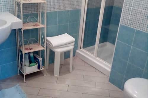 Double Room (Scheggia di Sole) | Bathroom | Shower, hair dryer, bidet, towels