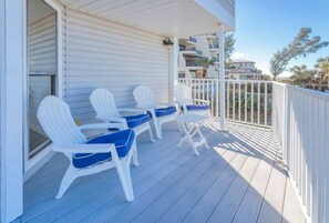 Relax on the outdoor deck with comfortable seating for four.
