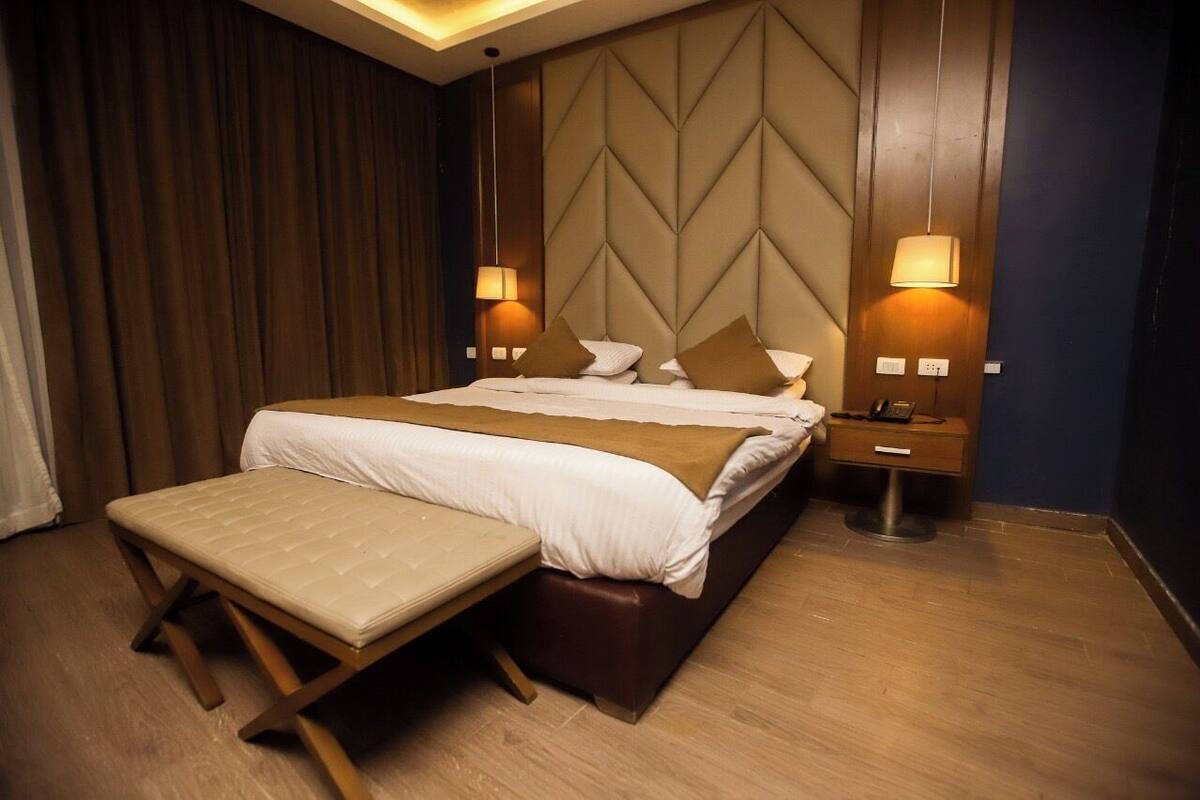 Deluxe Double Room, Pool View | Minibar (free items), desk, blackout drapes, WiFi (free)