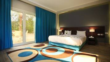 Standard Double Room, Garden View | Minibar (free items), desk, blackout drapes, WiFi (free)