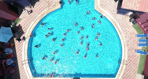 2 outdoor pools, open 9:00 AM to 7:00 PM, pool cabanas (surcharge)