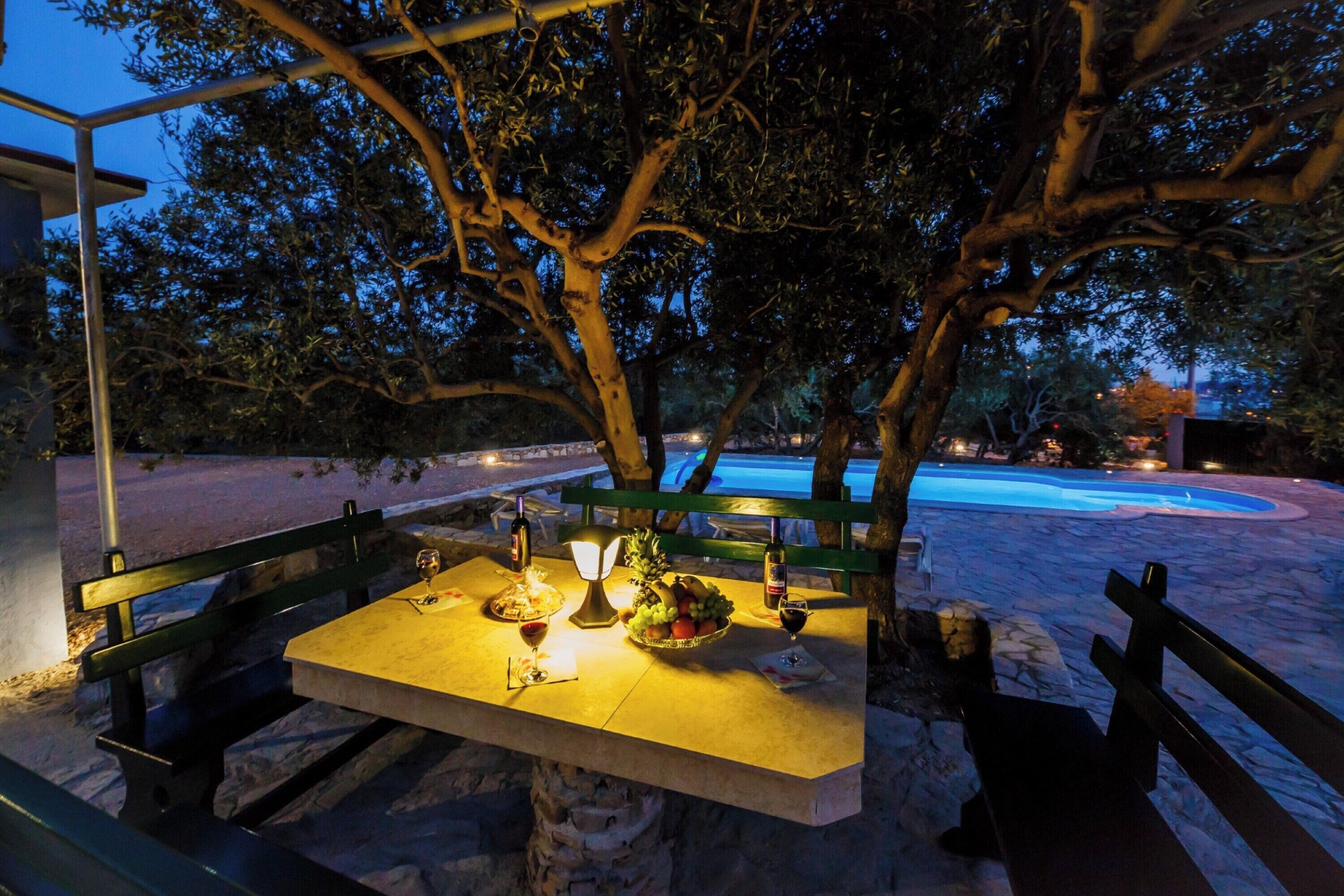 Seasonal outdoor pool, pool loungers