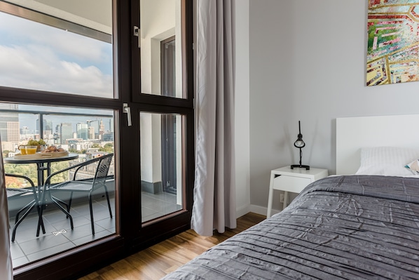 Exclusive Apartment, City View | 2 bedrooms, desk, laptop workspace, iron/ironing board