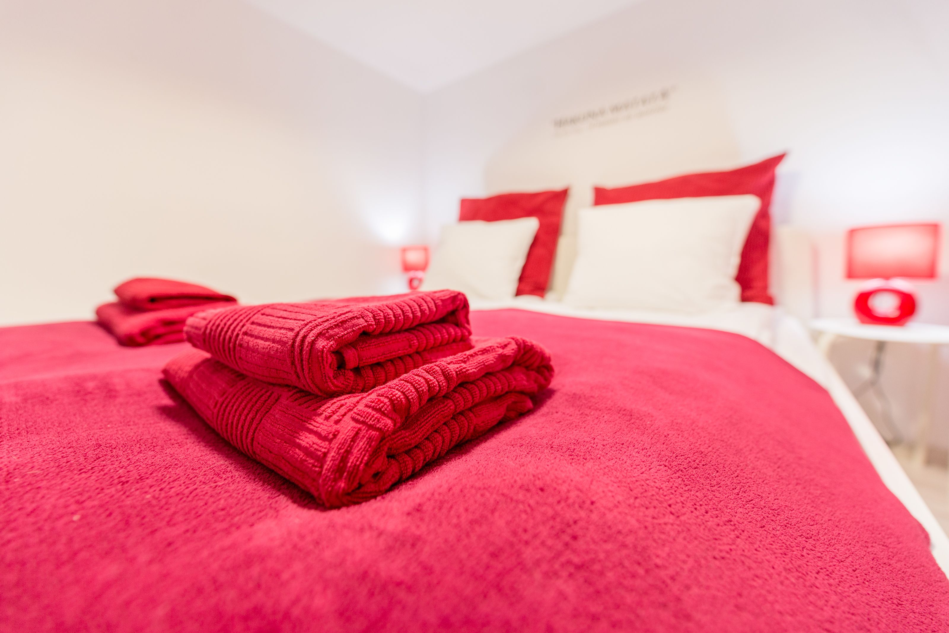 design apartment, 1 queen bed with sofa bed (red) | individually decorated, desk, laptop workspace, blackout curtains