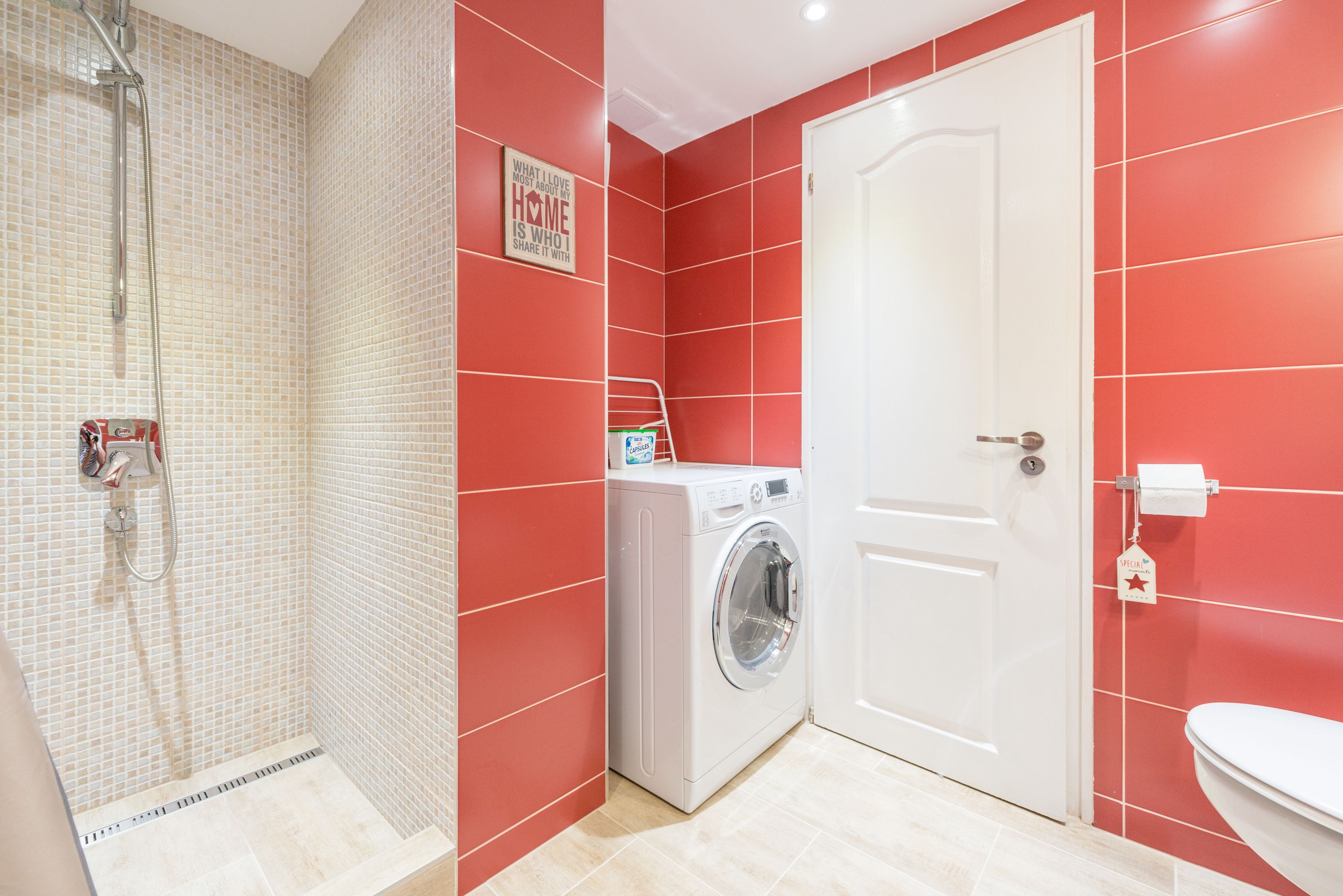 design apartment, 1 queen bed with sofa bed (red) | bathroom | hair dryer, towels, soap, shampoo