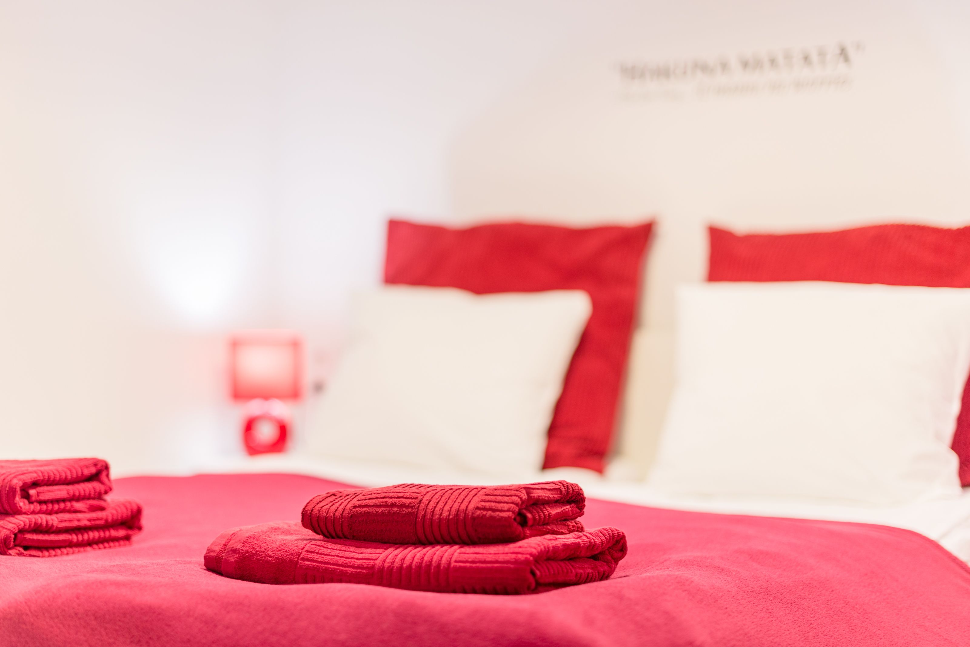 design apartment, 1 queen bed with sofa bed (red) | individually decorated, desk, laptop workspace, blackout curtains