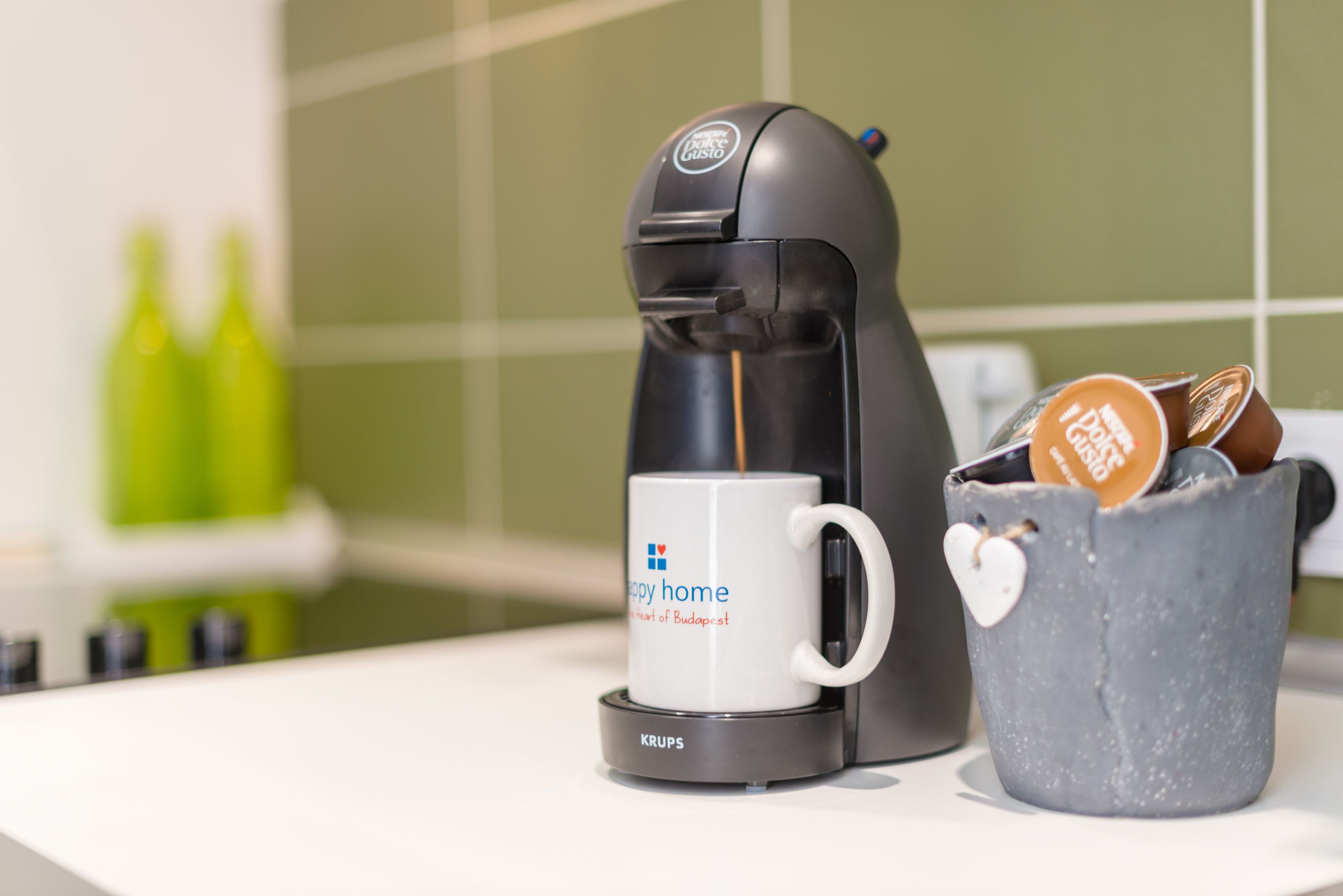 design apartment, 1 queen bed with sofa bed (green) | coffee and/or coffee maker