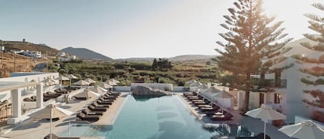 Seasonal outdoor pool, pool umbrellas, pool loungers