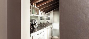 Little Tower Over The Roofs