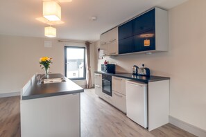 Appartement Deluxe, plusieurs lits | Détail de l’intérieur