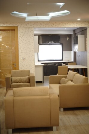 Appartement | Woonkamer | Flatscreentelevisie