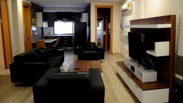 Apartment | Living area | Flat-screen TV