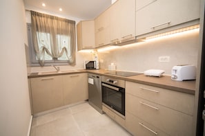 Villa, 2 chambres (Margarita) | Cuisine privée | Grand réfrigérateur, micro-ondes, four, plaque de cuisson