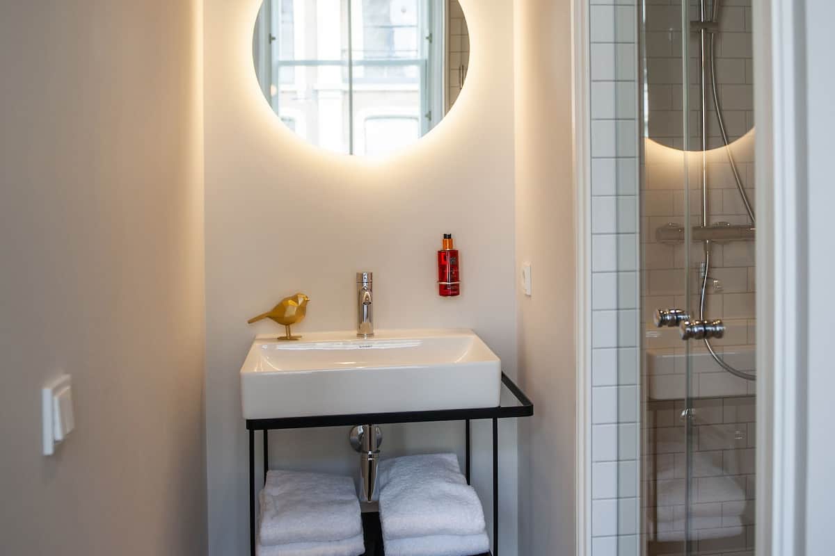 luxury room | bathroom | designer toiletries, hair dryer, towels, soap