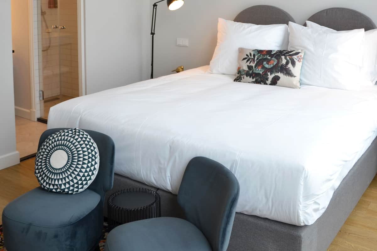 Boutique + | Premium bedding, in-room safe, desk, blackout drapes