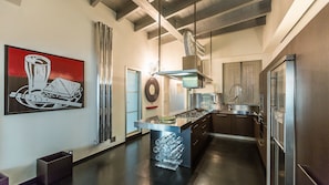 Apartment | Private kitchen | Full-size fridge, microwave, oven, dishwasher - Rental In Rome Cosmopolitan Hi-tech Luxury Apartment (Rome)