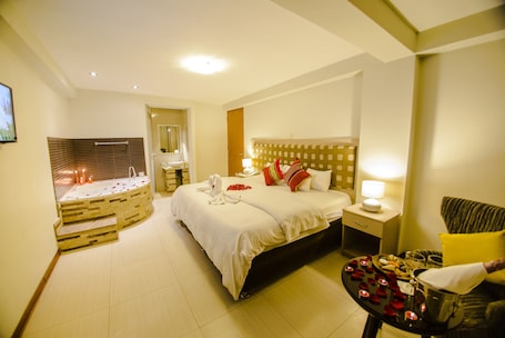 Junior Suite, 1 King Bed, Jetted Tub | In-room safe, desk, iron/ironing board, free WiFi. Wayta Inn