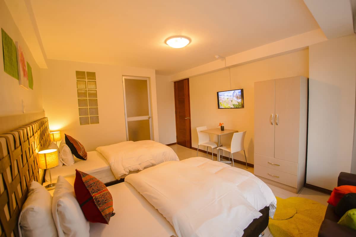 Deluxe-Zweibettzimmer, 2 Einzelbetten | Zimmersafe, Schreibtisch, Bügeleisen/Bügelbrett, kostenloses WLAN