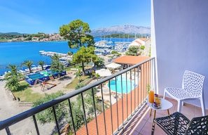 Standard Twin Room, Sea View | Premium bedding, down comforters, pillowtop beds, in-room safe