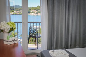 Standard Twin Room, Sea View | Premium bedding, down comforters, pillowtop beds, in-room safe