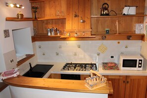 Appartement, 3 chambres | Coin cuisine privé