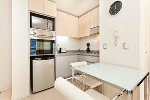 Fridge, microwave, stovetop, cookware/dishes/utensils