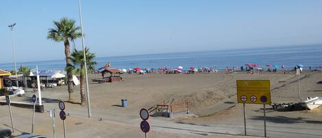 On the beach, sun loungers