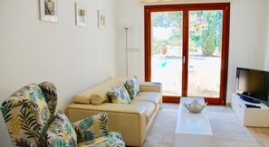 Villa | Living area | LCD TV, MP3 dock - Beautiful 2 Bedroom Villa Proteus HG29 with private pool and pretty golf course views, Short walk to resort village square on Aphrodite Hills (Kouklia)