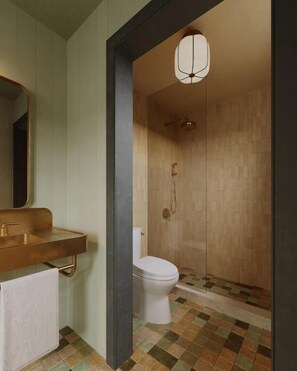 Designer toiletries, hair dryer, towels, soap