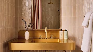 Designer toiletries, hair dryer, towels, soap