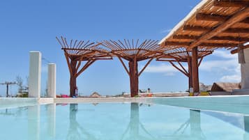 2 outdoor pools, open 7:00 AM to 10:00 PM, pool umbrellas, sun loungers