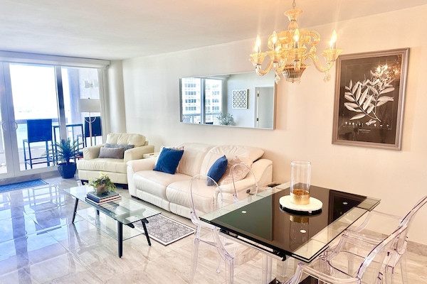 Impeccably decorated, enjoy beauty inside & on balcony w magnificent water views